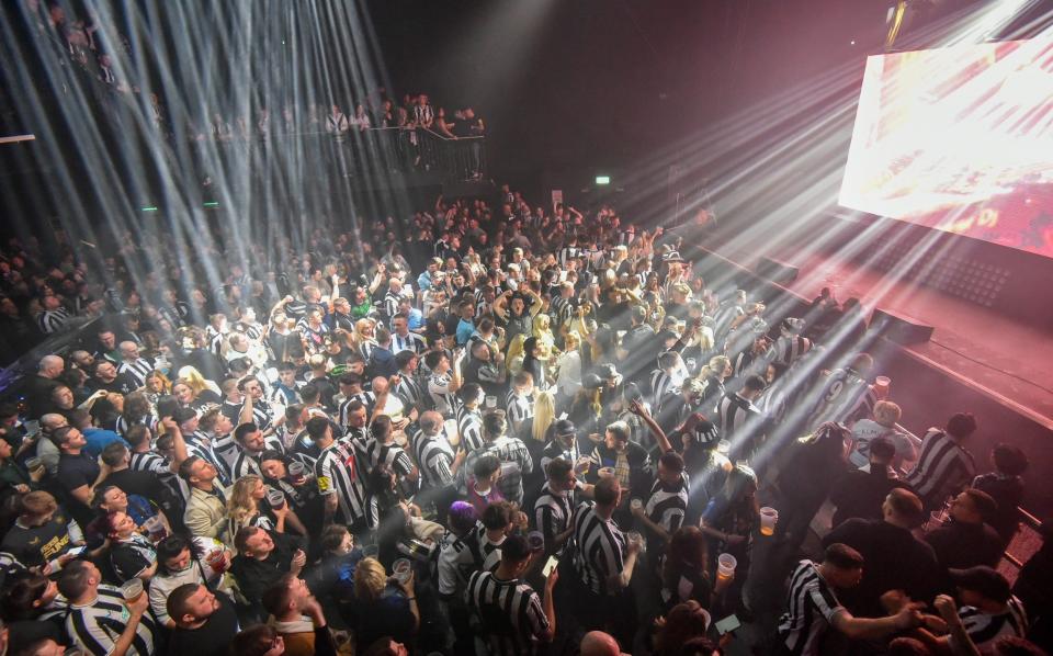 Newcastle United fans who couldn't make it to Wembley watch their side take on Manchester United in the Carabao League Cup Final via a big screen broadcast at NX Newcastle this afternoon. - Alex Elliott / NNP