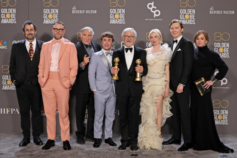 Tony Kushner, Seth Rogen, Judd Hirsch, Gabriel LaBelle, Steven Spielberg, Michelle Williams, Paul Dano, and Kristie Macosko Krieger, winners of Best Picture – Drama for “The Fabelmans,” pose at the 80th Annual Golden Globe Awards - Credit: Amy Sussman/Getty Images