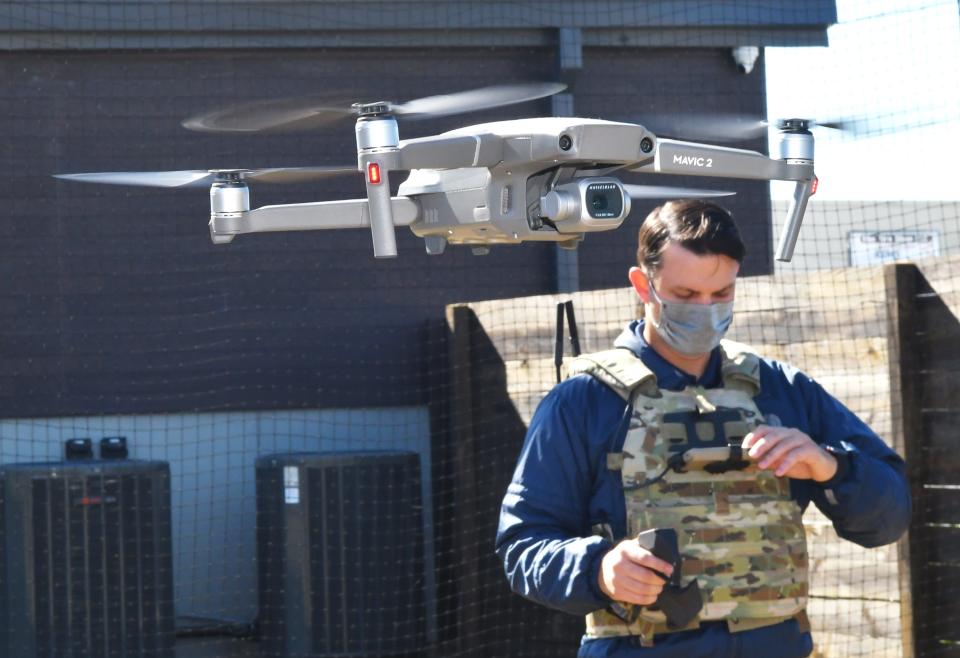 Michael Bowman, Tomahawk Robotics lead product engineer, operates a drone using a handheld controller inside the company's "drone cage" along U.S. 1 in Melbourne. Tomahawk Robotics moved into Groundswell Startups in late 2018 and has expanded rapidly since.