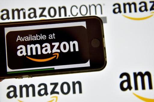 Amazon sales surge, but spending bites into profit
