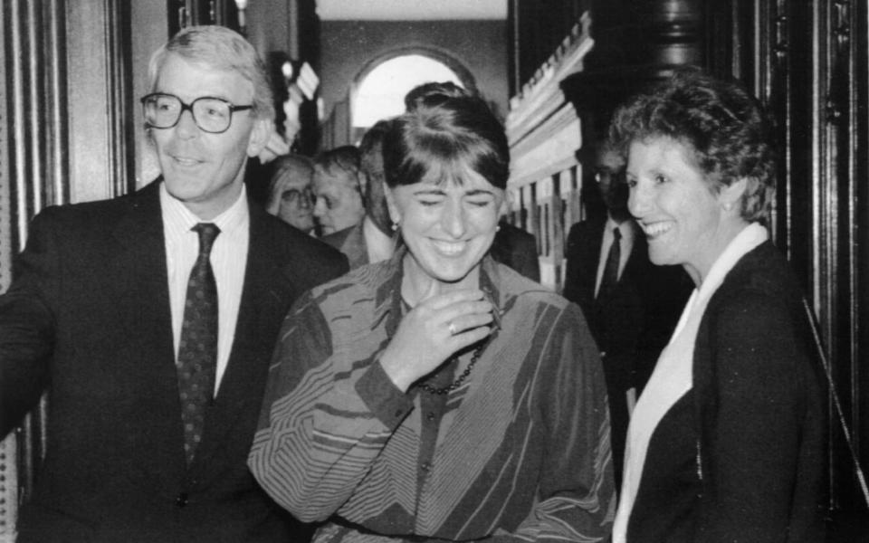 Former British Prime Minister John Major and his wife Norma  with Gordievsky's wife Layla, centre, at the British embassy in Moscow