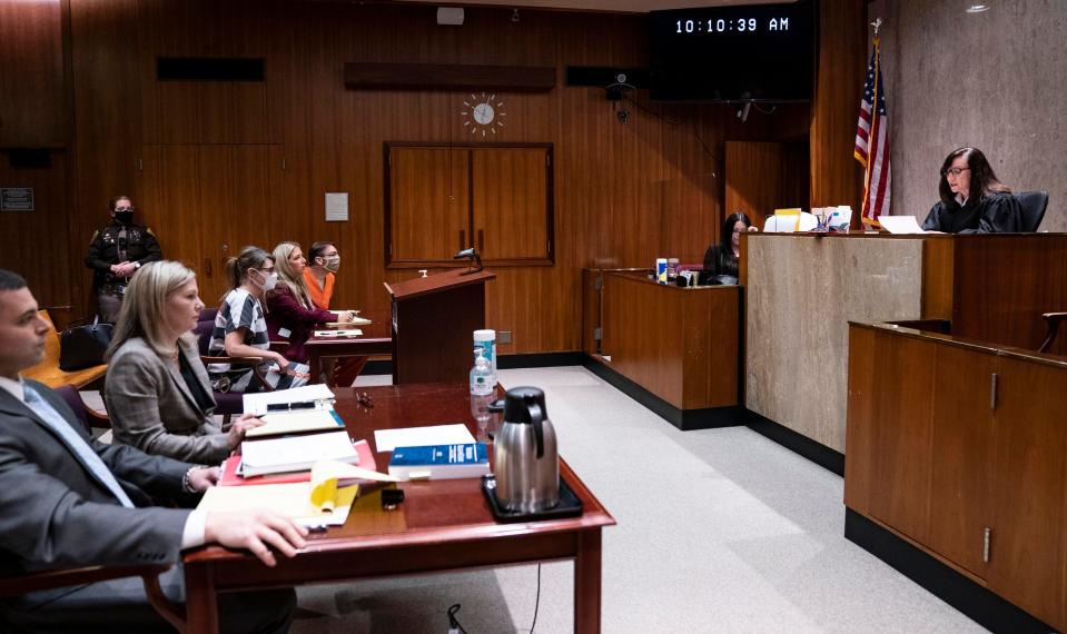 Oakland County Assistant Prosecutor Marc Keast, left, sits next to Oakland County Prosecutor Karen McDonald as Jennifer Crumbley, sat to the left of attorney Mariell Lehman and James Crumbley in the Oakland County courtroom of Judge Cheryl Matthews on March 22, 2022, regarding pretrial matters.