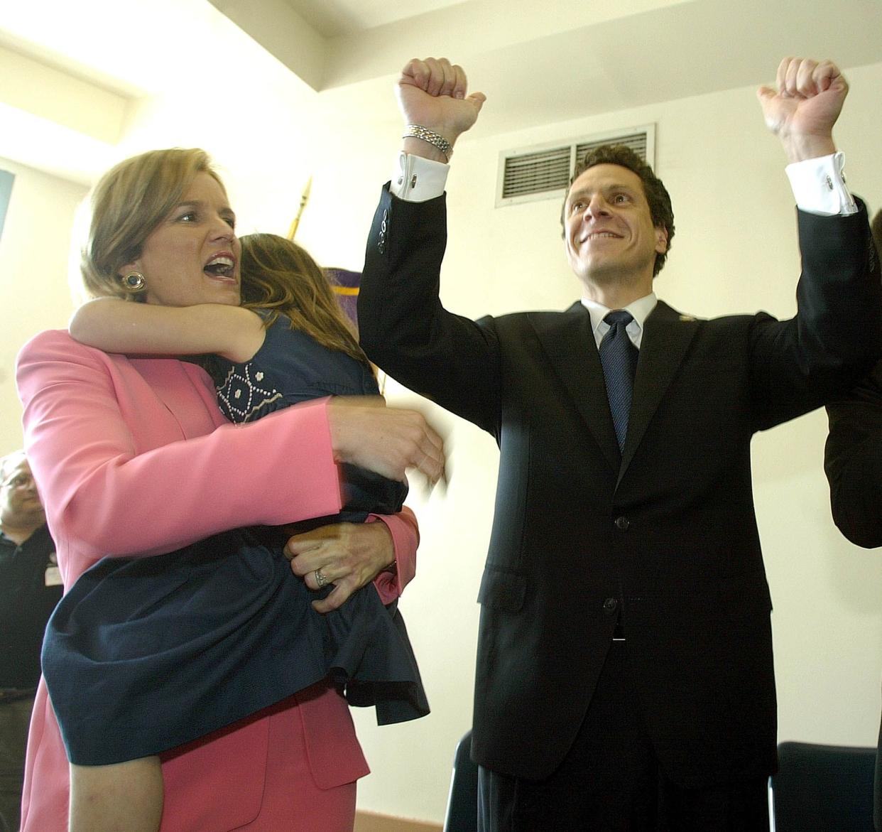 New York Democratic candidate for Governor Andrew Cuomo, right, campaigns with wife Kerrey Kennedy Cuomo, left, in Brooklyn, New York, on April 16, 2002.