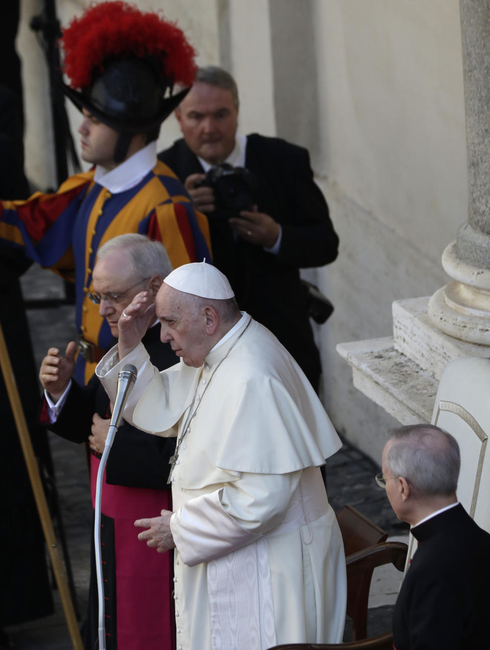 Pope Francis makes the sign of the cross during his weekly general audience general audience in San Damaso courtyard at the Vatican, Wednesday, Sept. 9, 2020. (AP Photo/Andrew Medichini)