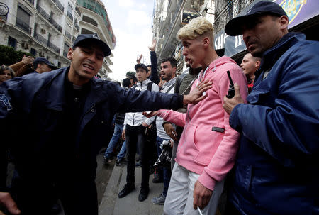 Police try to disperse students who are protesting against President Abdelaziz Bouteflika's plan to extend his 20-year rule by seeking a fifth term in Algiers, Algeria, February 26, 2019. REUTERS/Ramzi Boudina