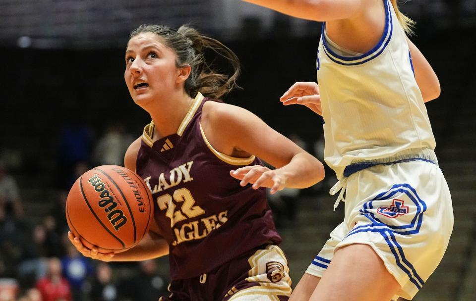 Columbia City Eagles guard Tessa Tonkel (22) rushes up the court Thursday, Oct. 5, 2023, during the Hall of Fame Classic girls basketball tournament at New Castle Fieldhouse in New Castle. The Columbia City Eagles defeated the Jennings County Panthers, 56-47.