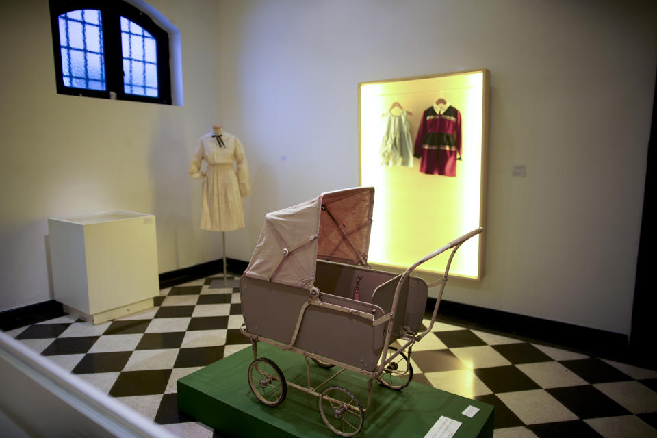 A toy baby carriage of the "Childhood and Peronism, the toys of the Eva Perón Foundation" exhibit is displayed at the Evita Museum in Buenos Aires, Argentina, Wednesday, April 17, 2019. Long before politicians started using social media platforms to influence public opinion, Peronism adopted a different strategy: handing out toys, like this baby carriage, to 4 million children from Argentina's poorest families. (AP Photo/Natacha Pisarenko)