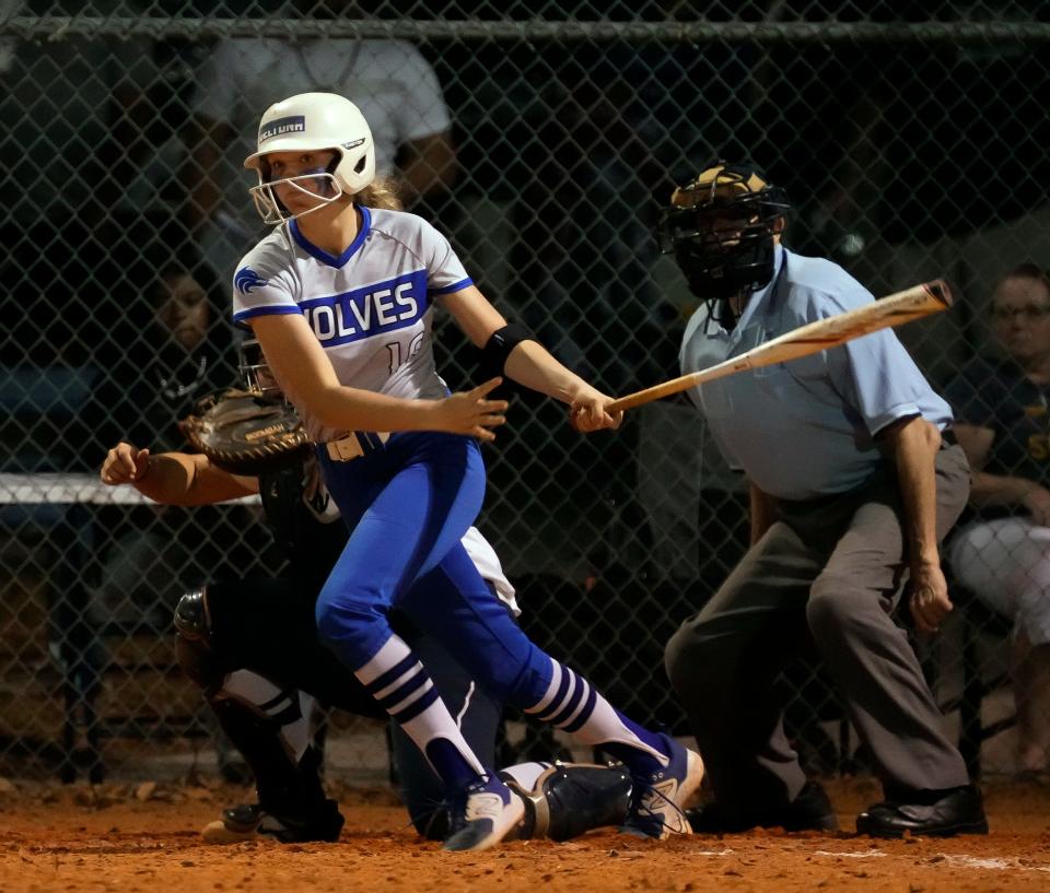 Deltona's Sophie Strempel connects for a single during game with Lake Howell softball at Deltona High School in Deltona, Thursday, March 7, 2024.