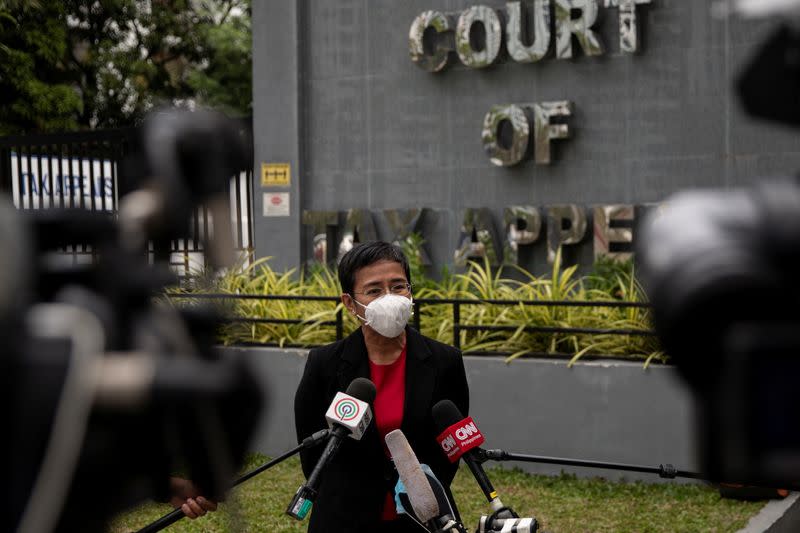 Filipino journalist and Rappler CEO Maria Ressa speaks to the media after testifying before the Court of Tax Appeals in Quezon City