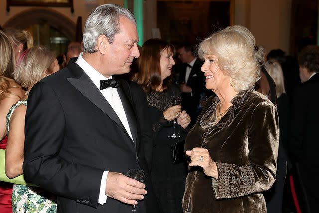 <p>Chris Jackson-WPA Pool/Getty</p> Paul Auster and Queen Camilla at the Man Booker Prize dinner and reception in London on October 17, 2017