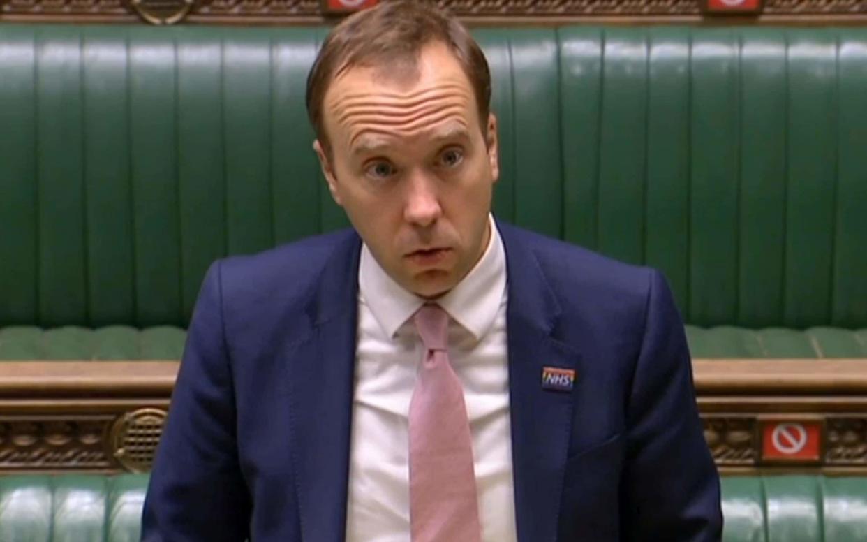 A video grab from footage broadcast by the UK Parliament's Parliamentary Recording Unit (PRU) shows Britain's Health Secretary Matt Hancock updating MPs on the COVID-19 pandemic, in the House of Commons in London - PRU/AFP via Getty Images