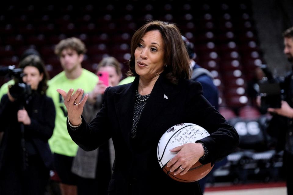 PHOTO: Vice President Kamala Harris holds a ball signed by the members of the currently number 1 ranked women's NCAA basketball team South Carolina Gamecocks during a visit in Columbia, South Carolina, on Jan. 15, 2024.   (Kevin Wurm/Reuters)
