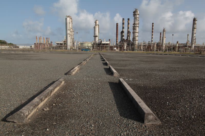 FILE PHOTO: An abandoned parking lot is seen outside the installations of the Hovensa petroleum refinery in St Croix