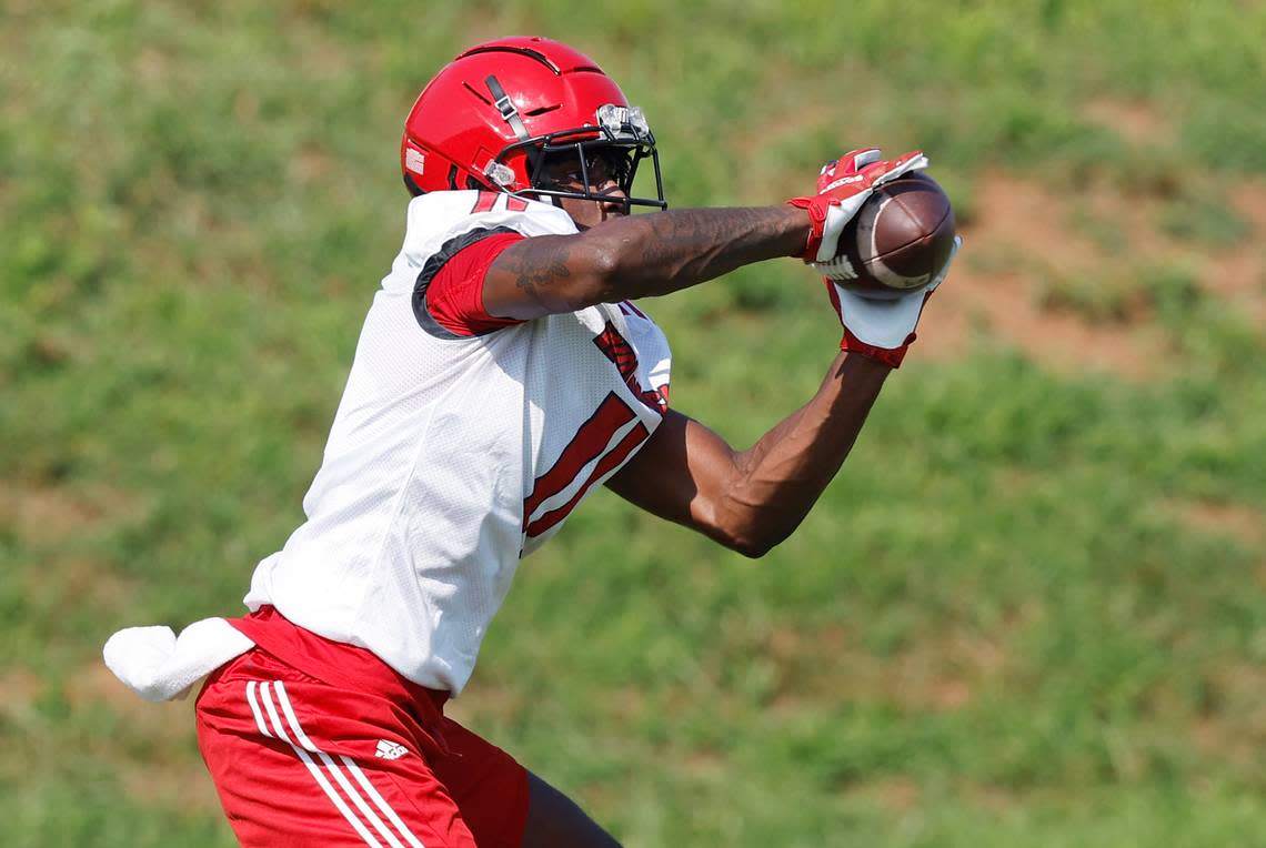 N.C. State wide receiver Darryl Jones (11) pulls in a reception during the Wolfpack’s first practice of fall camp in Raleigh, N.C., Wednesday, August 3, 2022.