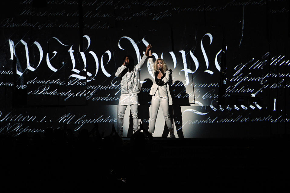 Skip Marley and Katy Perry perform onstage during The 59th Grammy Awards