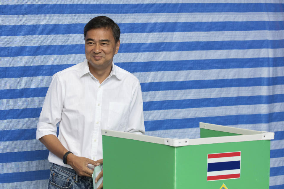 Democrat Party leader Abhisit Vejjajiva casts his vote at a polling station in Bangkok, Thailand, Sunday, March 24, 2019, during the nation's first general election since the military seized power in a 2014 coup. (AP Photo/Wason Wanichakorn)