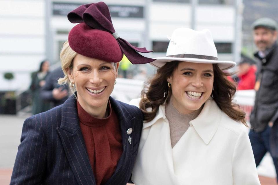 <p>Shutterstock</p> Zara Tindall and Princess Eugenie at the Cheltenham Festival on March 13, 2024