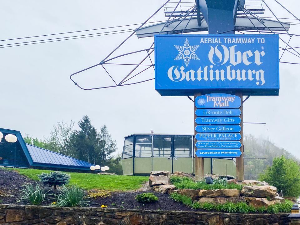 Grey skies behind a blue sign that says "Ober Gatlinburg"