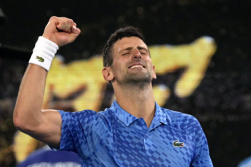 Novak Djokovic of Serbia celebrates after defeating Tommy Paul of the U.S. in their semifinal at the Australian Open tennis championship in Melbourne, Australia, Friday, Jan. 27, 2023. (AP Photo/Aaron Favila)