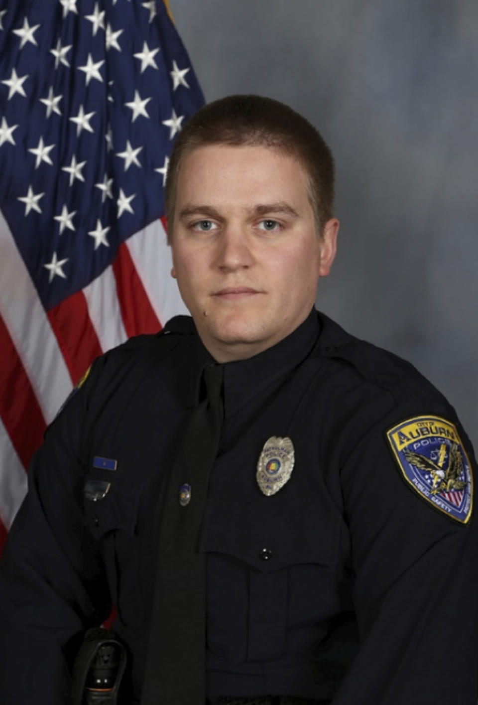 This undated photo provided by the Auburn Police Department shows Officer Webb Sistrunk, who was wounded while responding to a domestic disturbance report on Sunday, May 19, 2019. Grady Wayne Wilkes, who opened fire on police, killing one officer and wounding Sistrunk and a fellow officer, was arrested Monday, May 20 and charged with capital murder and attempted murder, authorities said. (Auburn Police Department via AP)