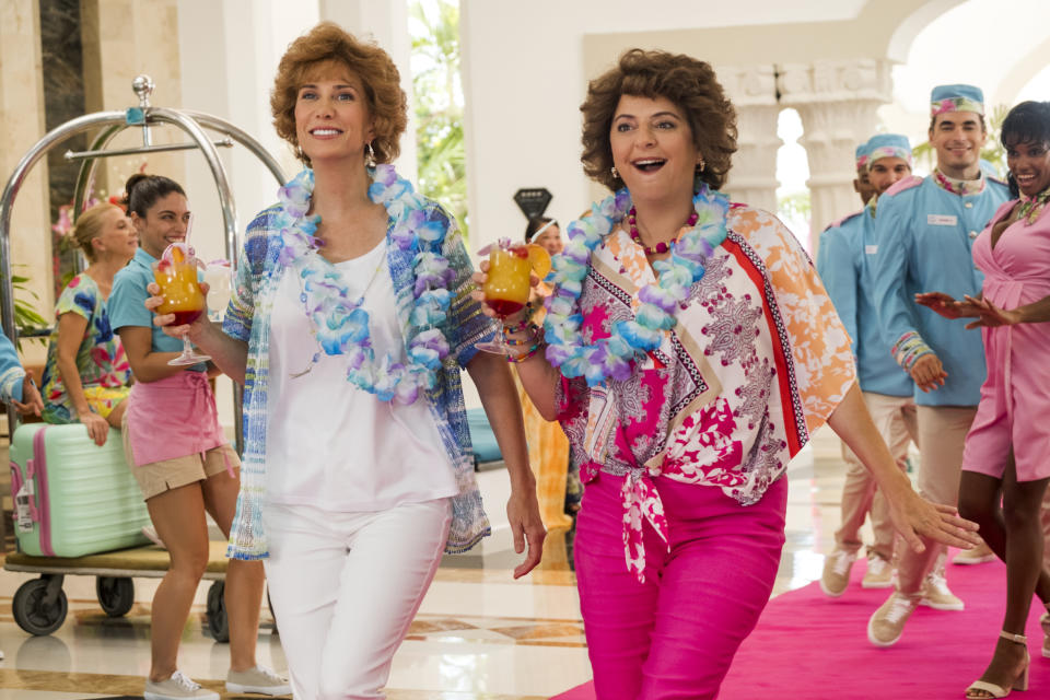 This image released by Lionsgate shows Kristen Wiig, left, and Annie Mumolo in "Barb and Star Go to Vista Del Mar." (Cate Cameron/Lionsgate via AP)