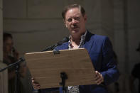 American writer Andrew Solomon speaks during a reading event in solidarity with Salman Rushdie outside the New York Public Library, Friday, Aug. 19, 2022, in New York. (AP Photo/Yuki Iwamura)