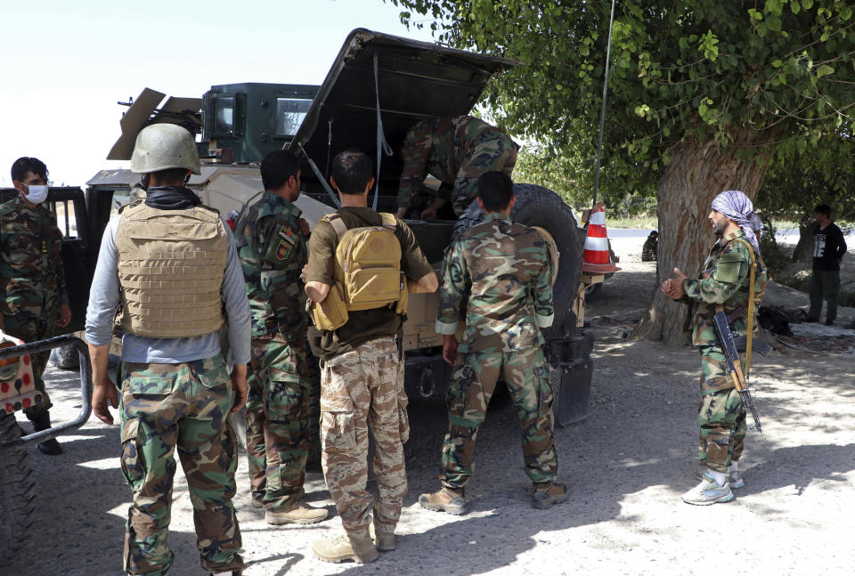 Afghan security personnel gear up to patrol, on the outskirts of Mazar-e-Sharif, Afghanistan, Tuesday, Aug. 10, 2021. (AP Photo/Mirwais Bezhan)