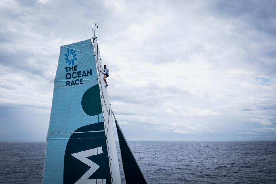 Biotherm Skipper Paul Meilhat climbs to the top of the mast to fix a little halyard problem on May 6 during the race to Newport.