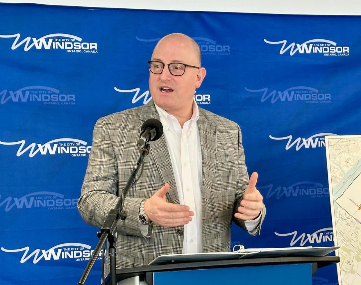 Windsor Mayor Drew Dilkens told reporters Friday that he doesn't feel that people who object to having four-plexes in their neighbourhoods should be labeled NIMBYs. (Dalson Chen/CBC - image credit)