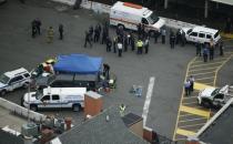 Emergency workers are seen in an aerial view outside the New Jersey Transit station following a train derailment and crash in Hoboken, New Jersey, U.S. September 29, 2016. REUTERS/Carlo Allegri