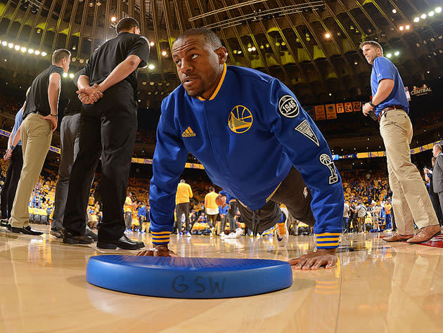 Andre Iguodala picks himself up from off the floor. (Getty Images)