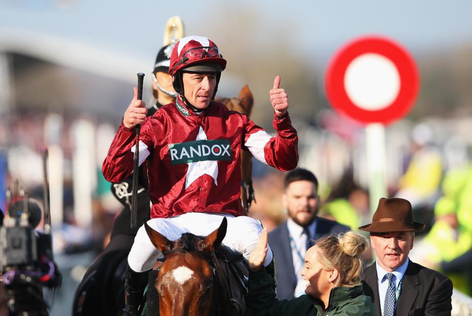 Davy Russell celebrates his win in the 2018 Grand National on Tiger Roll Photo: Getty Images