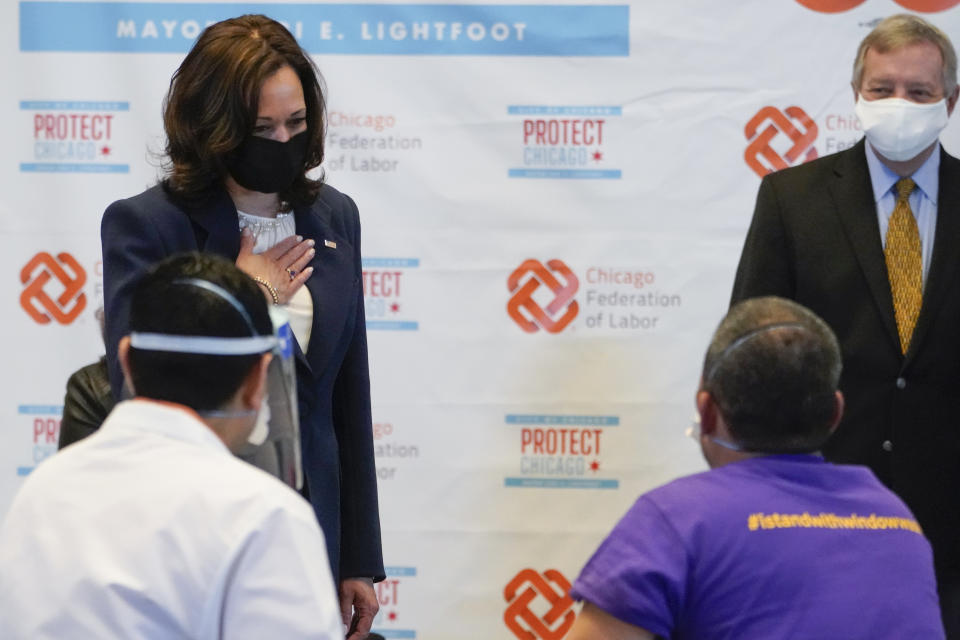 Vice President Kamala Harris talks with Lucio Polanco, a high-rise window washer, as he received the Johnson & Johnson COVID-19 vaccination from Osman Meah at COVID-19 vaccination site, Tuesday, April 6, 2021, in Chicago, as Sen. Dick Durbin, D-Ill., watches. The site is a partnership between the City of Chicago and the Chicago Federation of Labor. (AP Photo/Jacquelyn Martin)