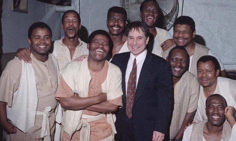 Joseph Shabalala, front left, with other members of Ladysmith Black Mambazo and Paul Simon in 1993.