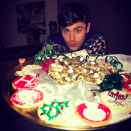 <p>Zac Efron is known for his ripped bod, but we’re happy to see he allowed himself to have a cheat day on Christmas: “I’m hopping on the cookie train.‬” (Photo: <a rel="nofollow noopener" href="https://www.instagram.com/p/BOdeSAQj0vO/" target="_blank" data-ylk="slk:Instagram;elm:context_link;itc:0" class="link ">Instagram</a>) </p>