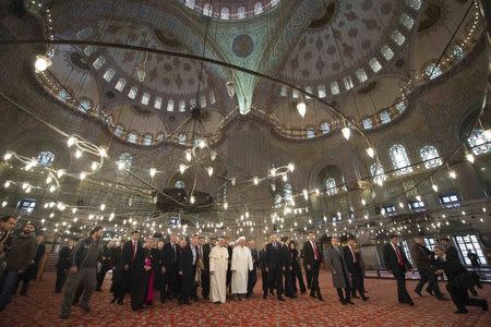 Pope Francis is shown the Sultan Ahmet mosque, popularly known as the Blue Mosque, by Mufti of Istanbul, Rahmi Yaran, during his visit to Istanbul November 29, 2014. (REUTERS/Osservatore Romano)