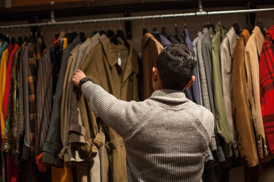 a person shopping at a thrift store