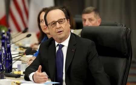 French President Francois Hollande speaks during his meeting with U.S. President Barack Obama at the Nuclear Security Summit in Washington March 31, 2016. REUTERS/Kevin Lamarque