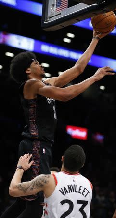 Dec 7, 2018; Brooklyn, NY, USA; Brooklyn Nets center Jarrett Allen (31) goes to the basket against Toronto Raptors guard Fred VanVleet (23) during overtime at Barclays Center. The Brooklyn Nets won 106-105. Noah K. Murray-USA TODAY Sports