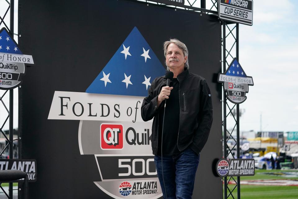 Comedian Jeff Foxworthy speaks to the fans before a NASCAR Cup Series at Atlanta Motor Speedway on Sunday, March 21, 2021, in Hampton, Ga. (AP Photo/Brynn Anderson)