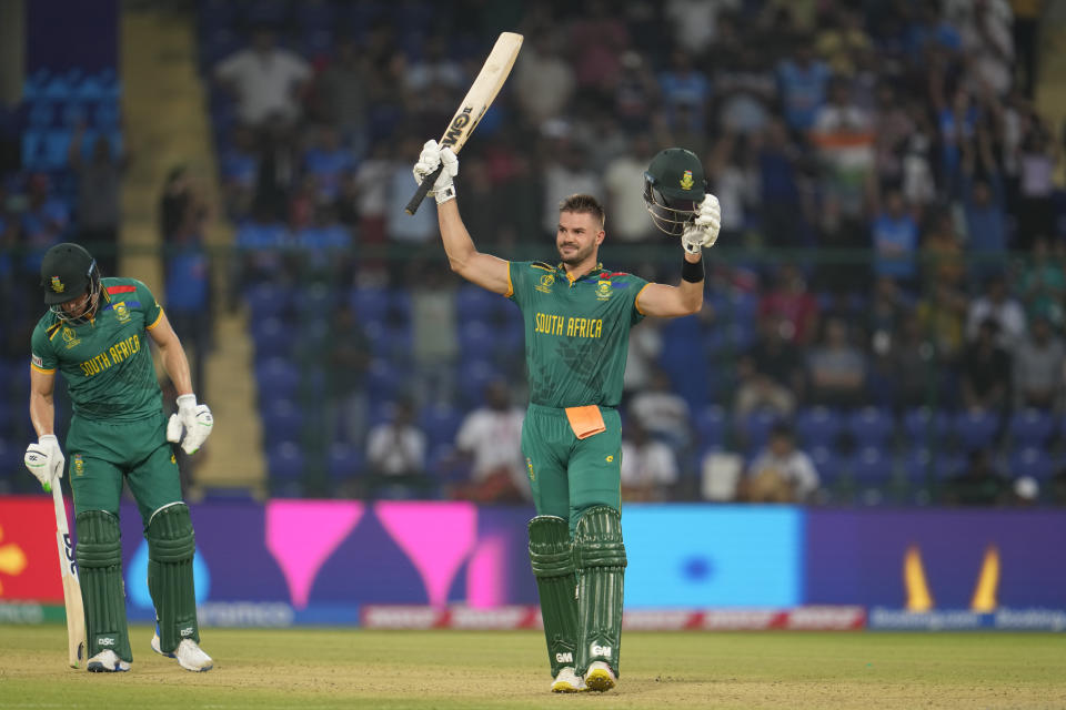 South Africa's Aiden Markram celebrates after scoring a century during the ICC Cricket World Cup match between South Africa and Sri Lanka in New Delhi, India, Saturday, Oct. 7, 2023. (AP Photo/Altaf Qadri )