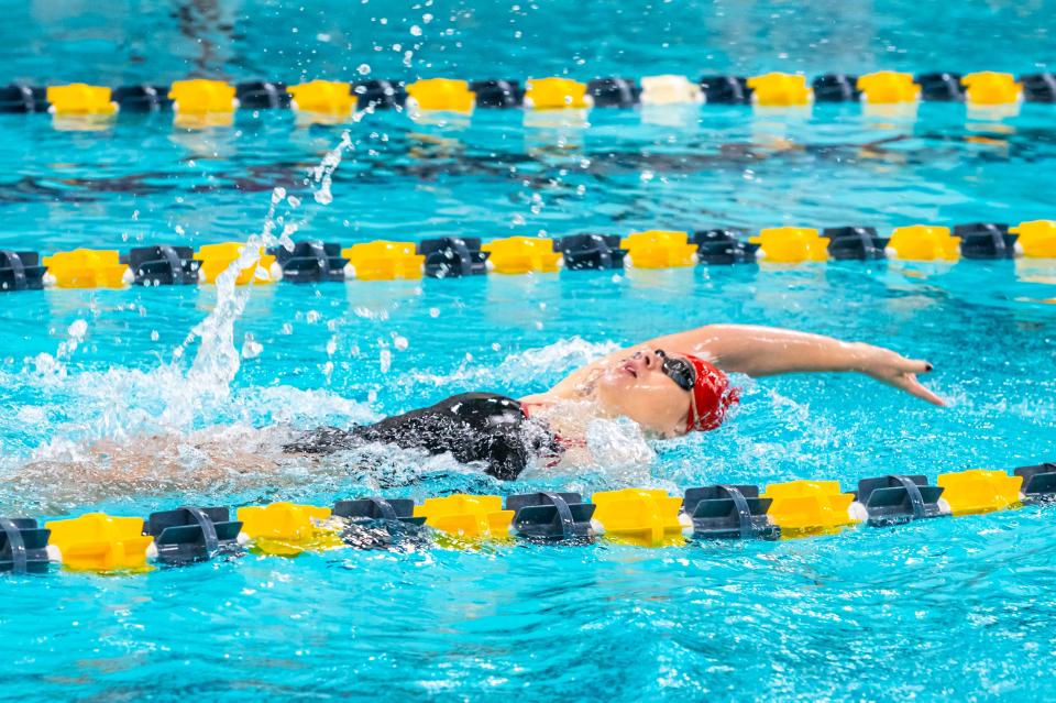 New Bedford's Cynthia Torres competes in the 100 backstroke.