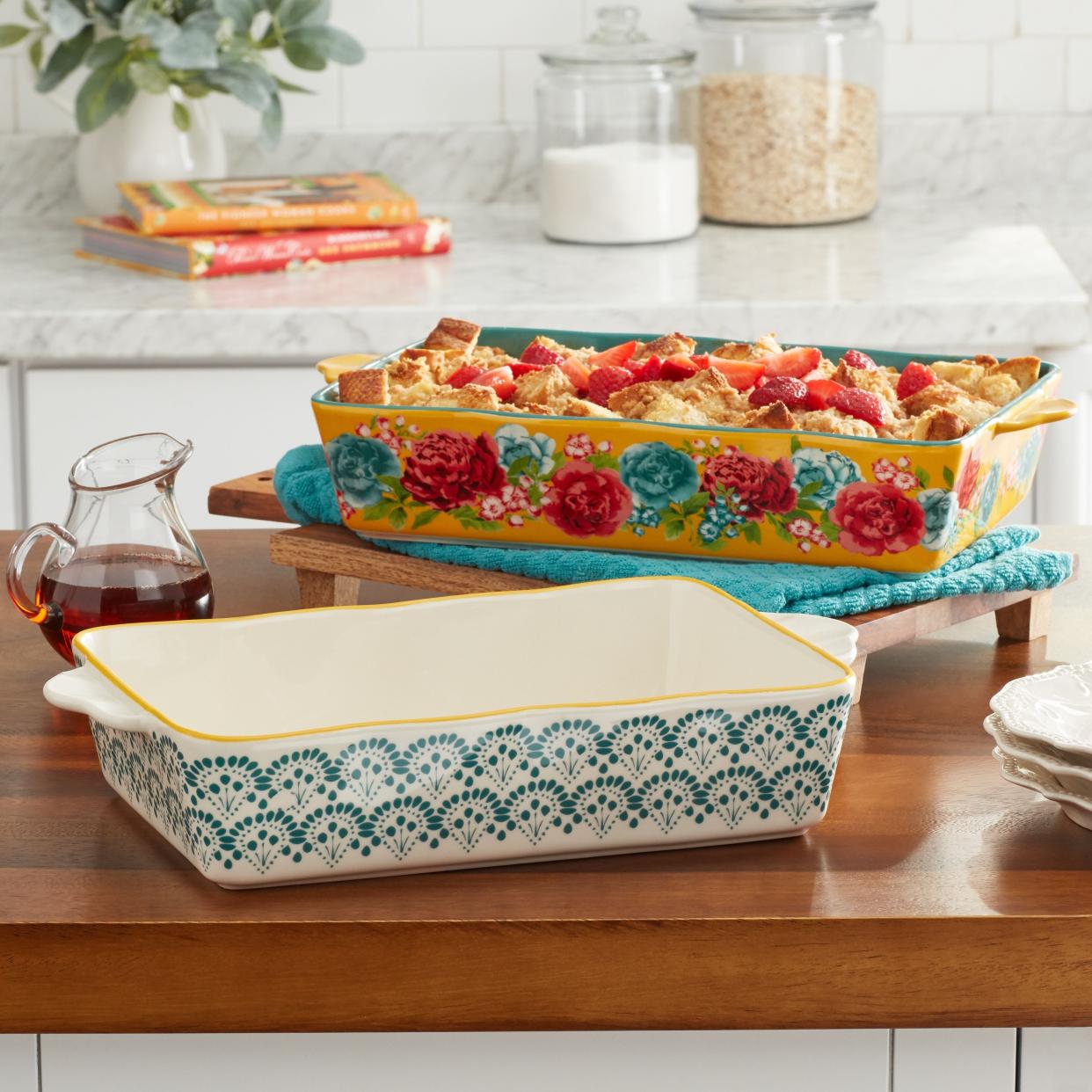 <p><a href="https://go.redirectingat.com?id=74968X1596630&url=https%3A%2F%2Fwww.walmart.com%2Fip%2FThe-Pioneer-Woman-Blossom-Jubilee-Ceramic-Baker-Set-2-Piece-Set%2F415110865&sref=https%3A%2F%2Fwww.goodhousekeeping.com%2Flife%2Fmoney%2Fa61208308%2Fthe-pioneer-woman-baking-dish-platter-lid-walmart%2F" rel="nofollow noopener" target="_blank" data-ylk="slk:Shop Now;elm:context_link;itc:0;sec:content-canvas" class="link rapid-noclick-resp">Shop Now</a></p><p>The Pioneer Woman Blossom Jubilee Ceramic Baker Set</p><p>walmart.com</p><p>$24.97</p>