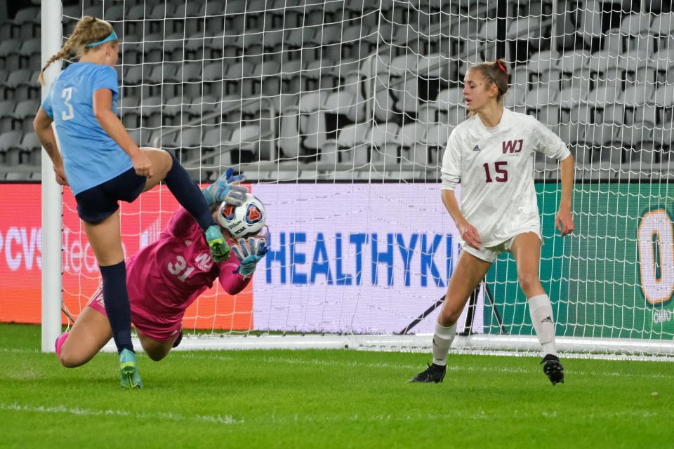 Mount Notre Dame forward Peyton Kohls (3) scores a goal during the OHSAA girls Division I state soccer championship against Walsh Jesuit at Lower.com Field in Columbus, Ohio, Friday, Nov. 12, 2021.