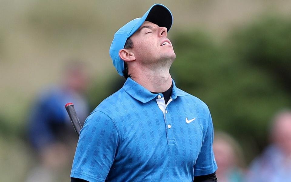 Rory McIlroy reacts after missing a two-foot putt on the 16th at the Open - PA