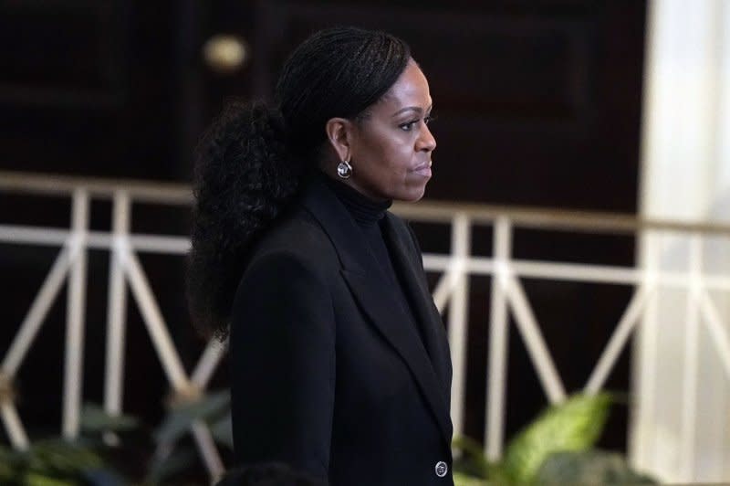 Former first lady Michelle Obama arrives before a tribute service for former first lady Rosalynn Carter at Glenn Memorial Church at Emory University on Tuesday. Pool Photo by Brynn Anderson/UPI