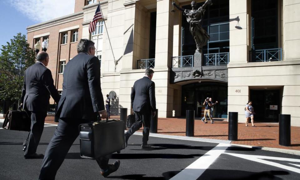 Members of the defense team for Paul Manafort walk to the federal courthouse in Alexandria, Virginia Tuesday.