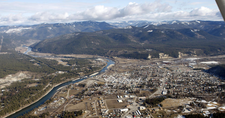 FILE - The town of Libby Mont., is shown Feb. 17, 2010. A major U.S. railroad found partially liable for asbestos contamination that’s killed hundreds of people in a Montana town is trying to convince a federal jury a local clinic submitted hundreds of asbestos claims for people who weren’t sick. (AP Photo/Rick Bowmer, File)