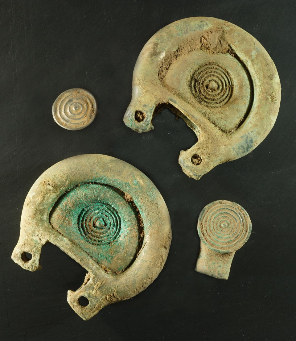 Embargoed to 0001 Monday August 10 Undated handout photo of Crown Office Communications of objects found by metal detectorist Mariusz Stepien, in the Scottish Borders, which are believed to be decorative and functional pieces of a Bronze Age harness.