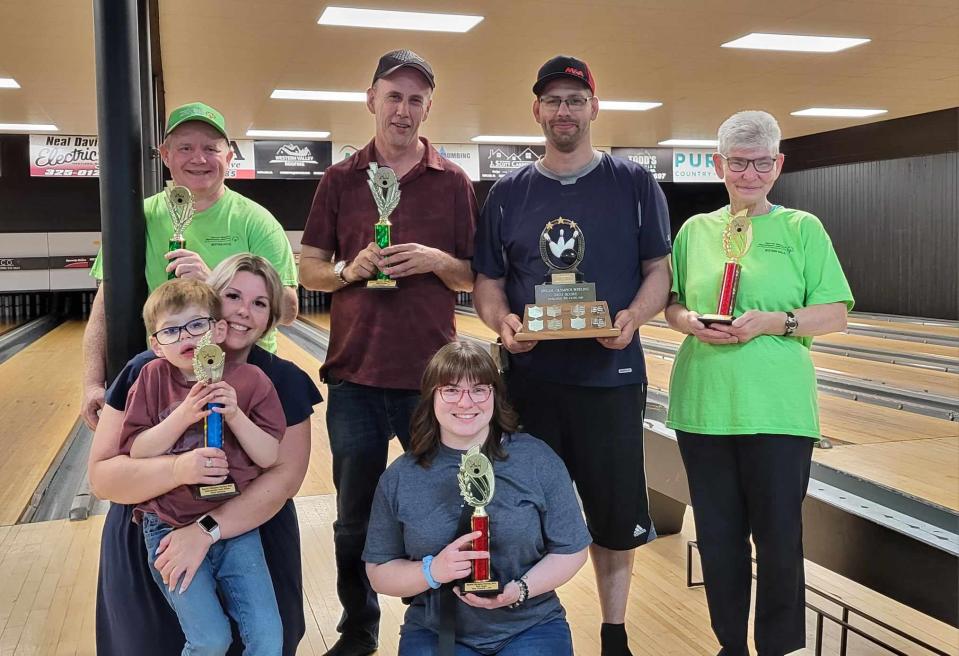 The 2024 bowling trophy winners include, front row, from left, Floyd Atherton, with his mother Emily, and Abby Crawford. Back row, from left, Chris Grant, Kevin Leighton, Marco Gauvin and Patti Connors.